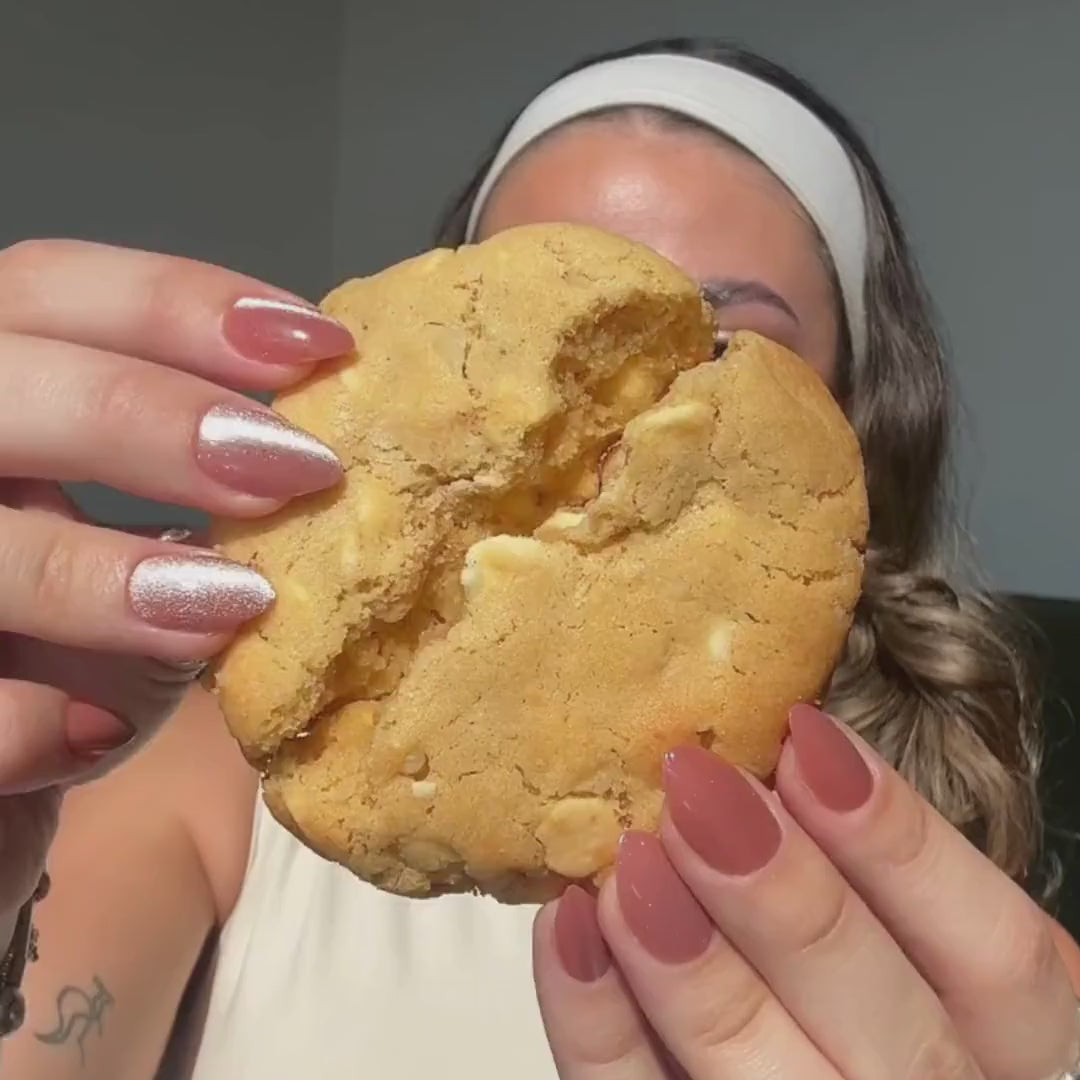 Customer reviewing delivery of a our best sellers cookie box